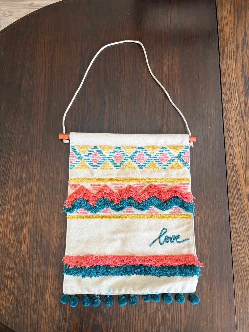 Primitives by Kathy Boho Wall Hanging Love Embroidered Tassel Pom Pom Decor